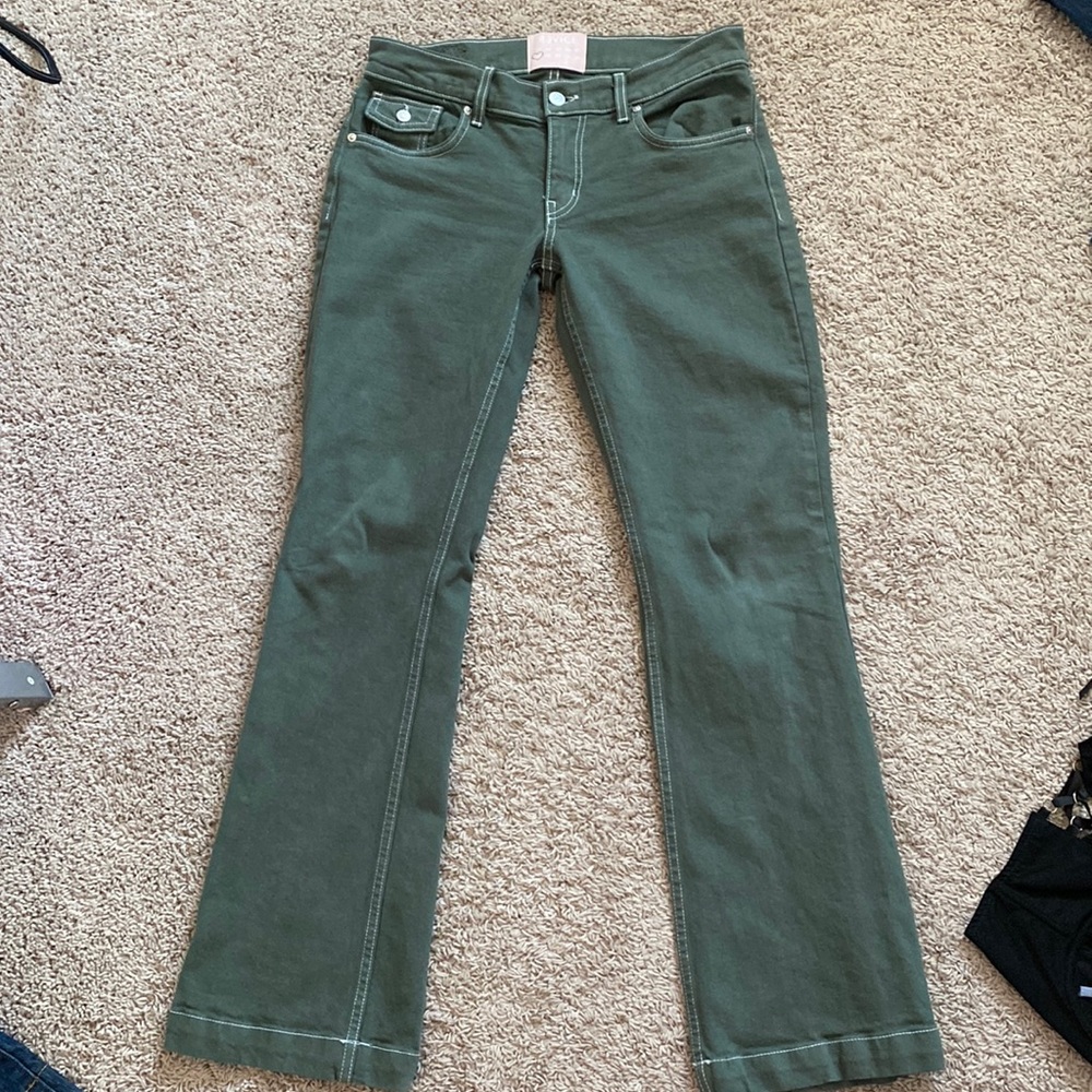 Revice green denim jeans low rise but not really low. New